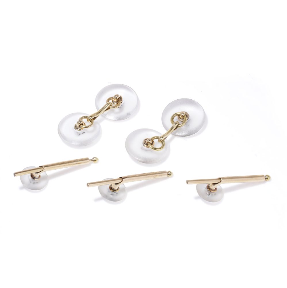 Cartier cufflinks and shirt studs in gold and platinum with rock crystals and diamonds.