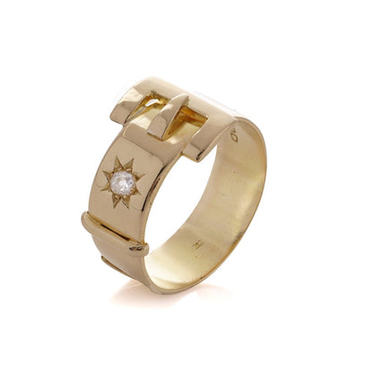 Antique men's belt buckle gold ring accented a diamond.