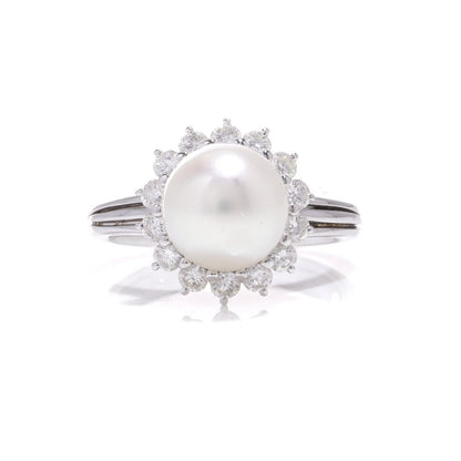 Mappin & Webb pearl and diamond cluster ring in white gold.
