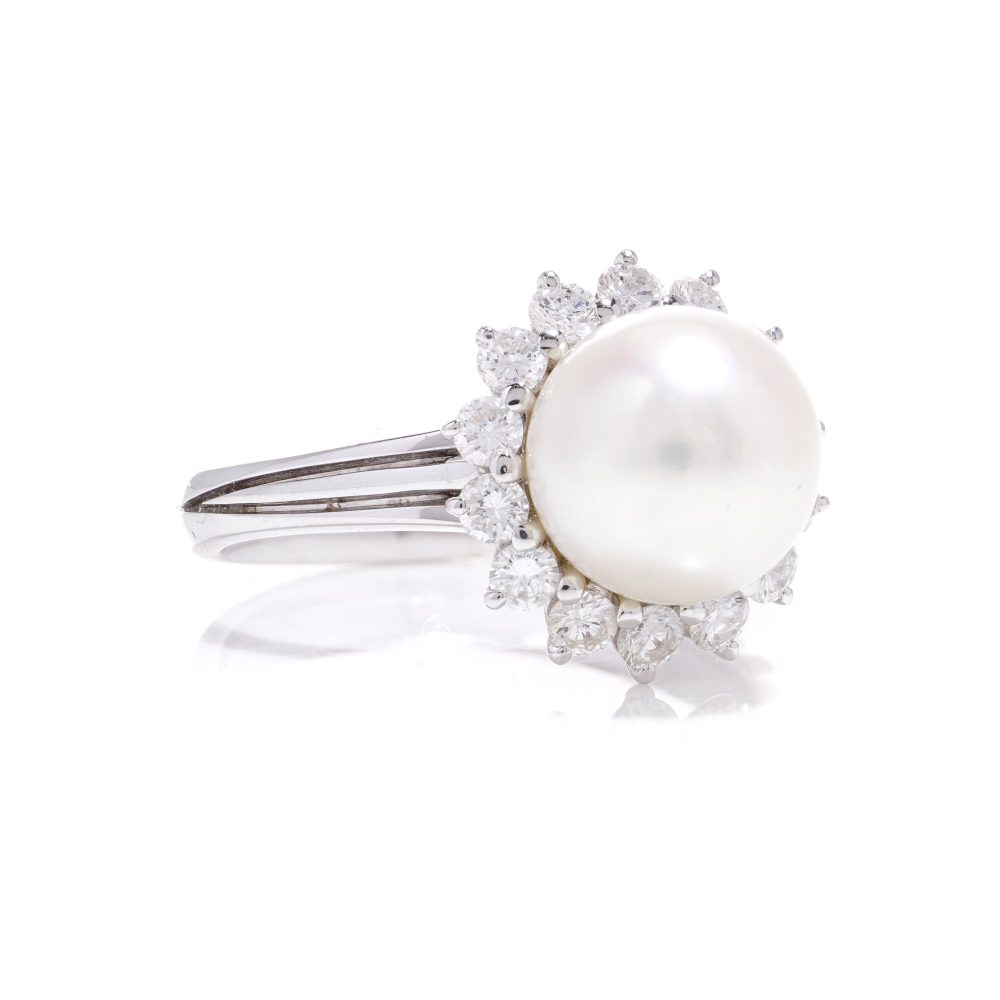 Mappin & Webb pearl and diamond cluster ring in white gold.