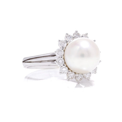 Mappin & Webb pearl and diamond cluster ring in white gold.
