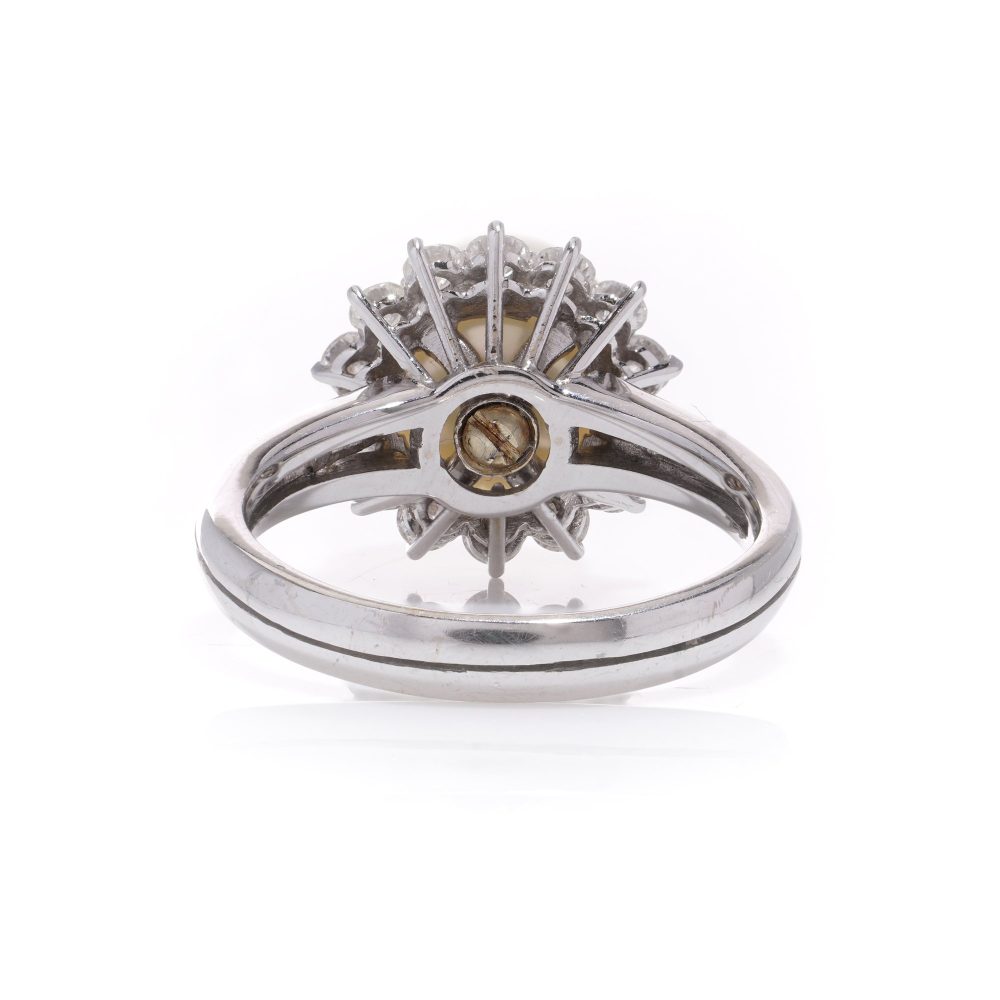 Mappin & Webb pearl and diamond cluster ring in white gold.