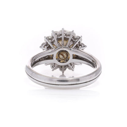 Mappin & Webb pearl and diamond cluster ring in white gold.