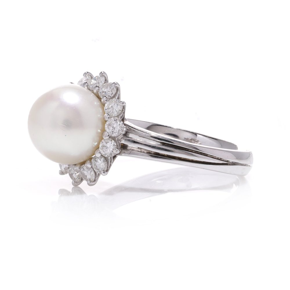Mappin & Webb pearl and diamond cluster ring in white gold.
