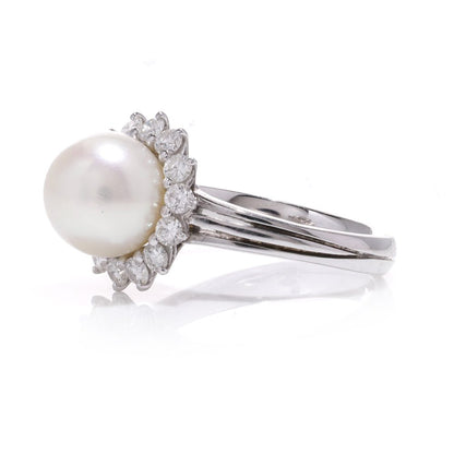 Mappin & Webb pearl and diamond cluster ring in white gold.