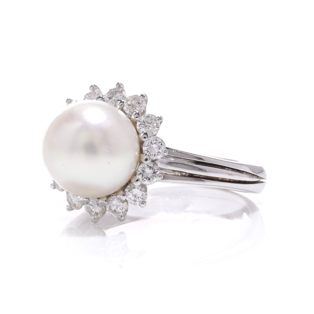 Mappin & Webb pearl and diamond cluster ring in white gold.