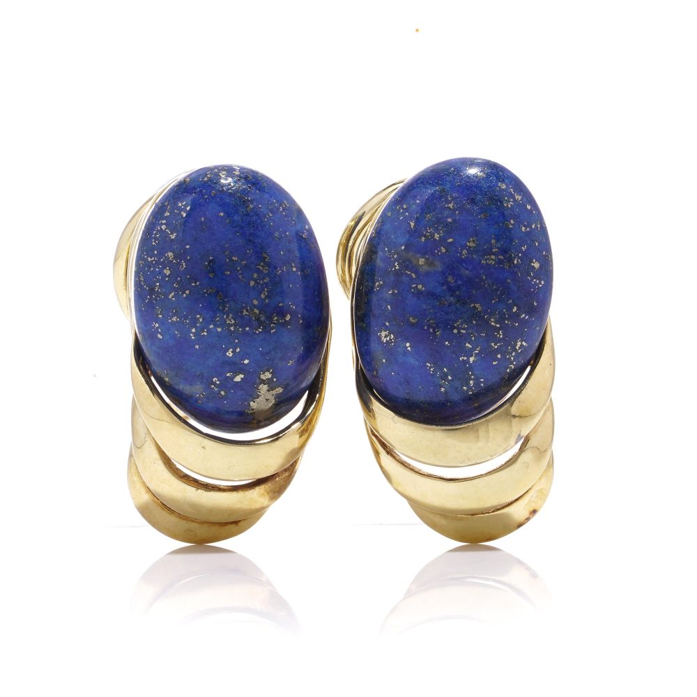 Vintage gold clip-on stud earrings with lapis lazuli stones.