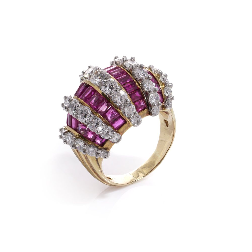 Vintage gold dome ring set with diamonds and rubies.