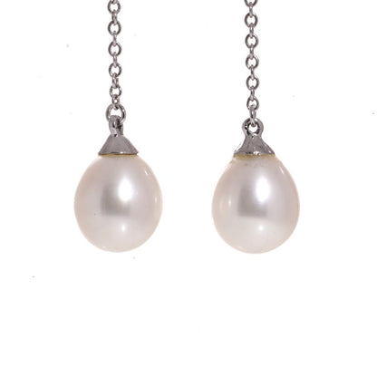 Tiffany & Co pearl drop earrings in white gold.