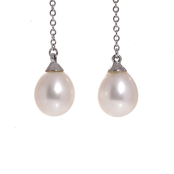 Tiffany & Co pearl drop earrings in white gold.