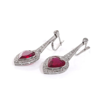 Platinum earrings with rubies and diamonds.