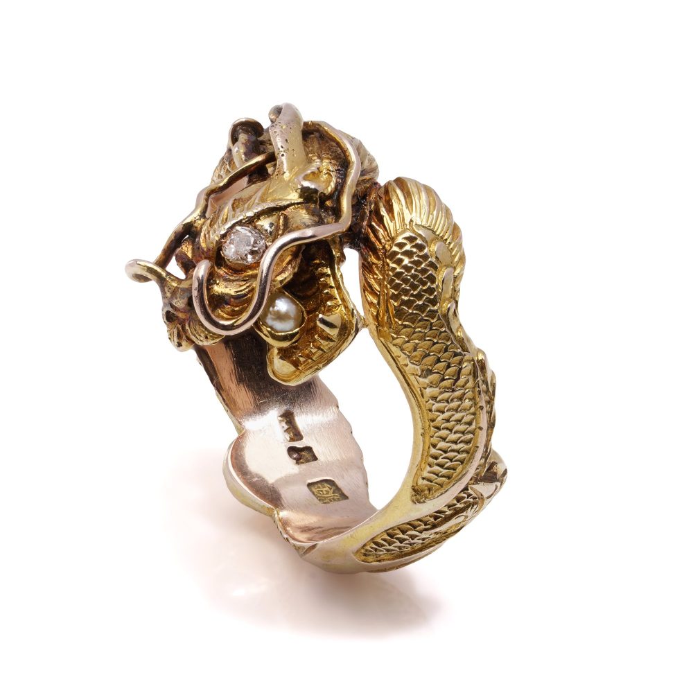 Chinese gold men's dragon ring set with diamond and pearl.