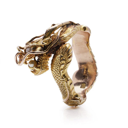 Chinese gold men's dragon ring set with diamond and pearl.
