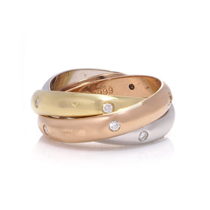 Cartier gold and diamond trinity ring.