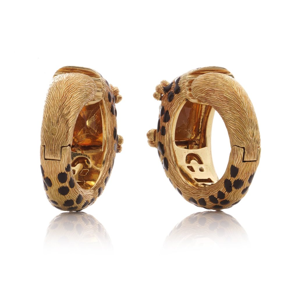 Dior leopard design citrine clip earrings in gold and black enamel.