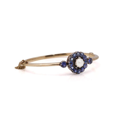 Victorian gold and silver sapphire cluster bangle with natural pearl.