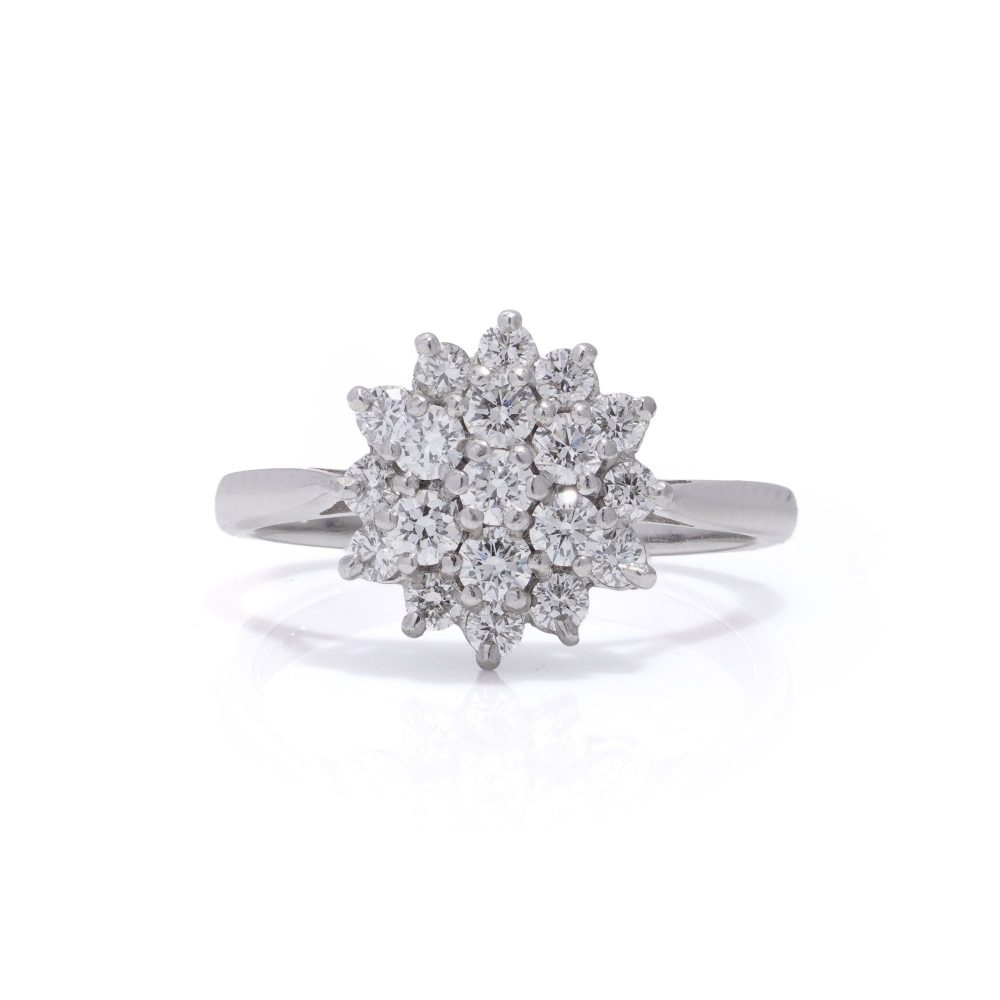 Vintage white gold flower head diamond cluster ring.