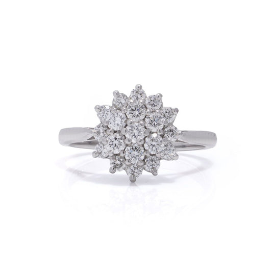 Vintage white gold flower head diamond cluster ring.