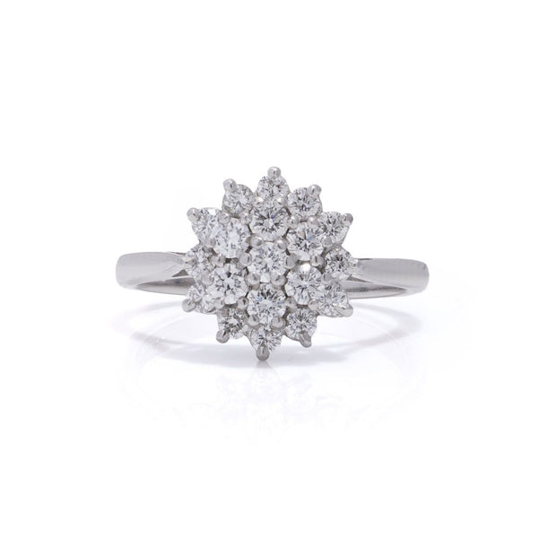 Vintage white gold flower head diamond cluster ring.