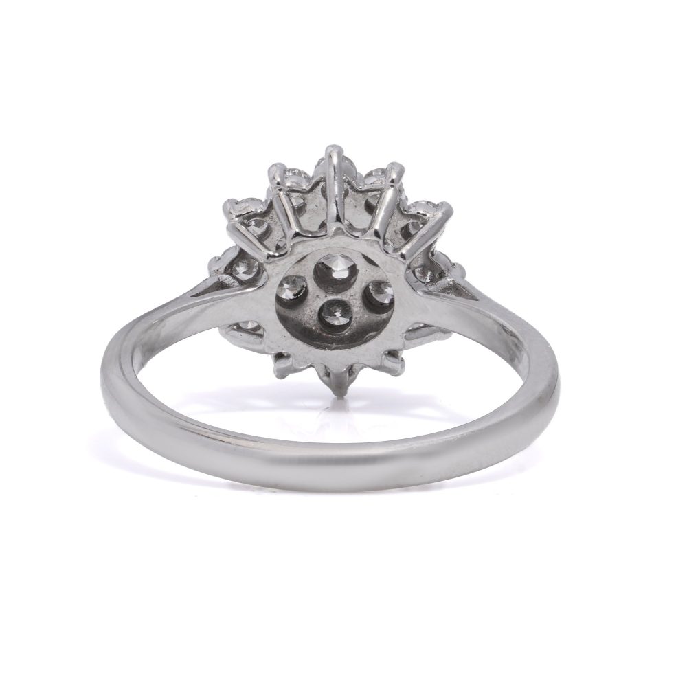 Vintage white gold flower head diamond cluster ring.