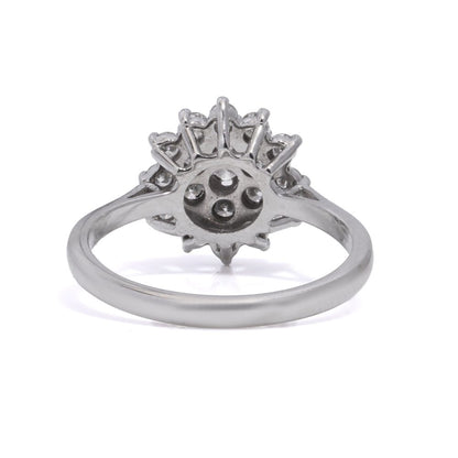 Vintage white gold flower head diamond cluster ring.