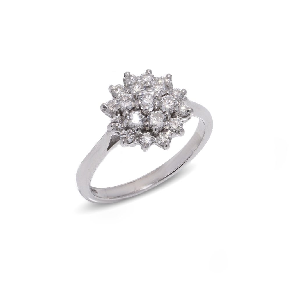 Vintage white gold flower head diamond cluster ring.