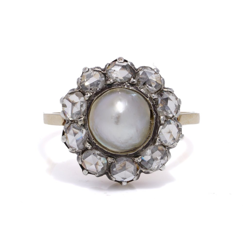 Victorian pearl and diamond cluster ring in gold and silver.