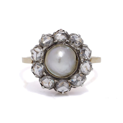 Victorian pearl and diamond cluster ring in gold and silver.