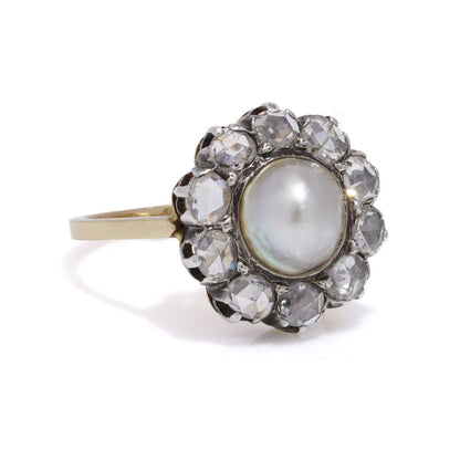 Victorian pearl and diamond cluster ring in gold and silver.