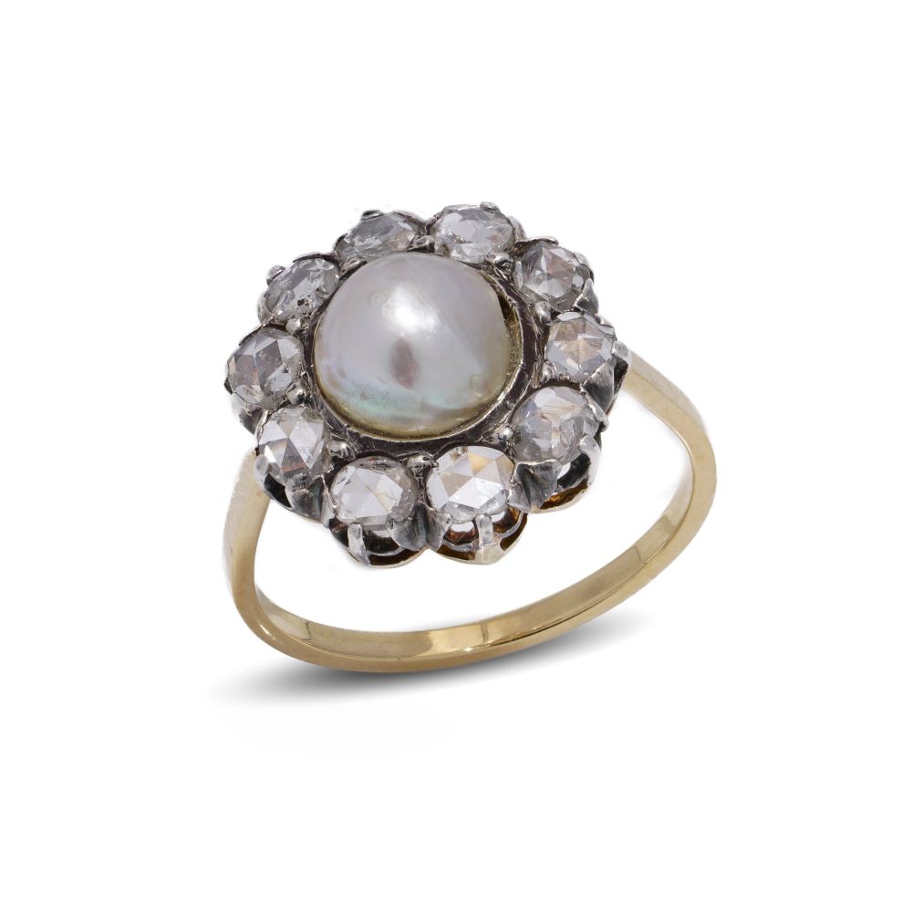 Victorian pearl and diamond cluster ring in gold and silver.