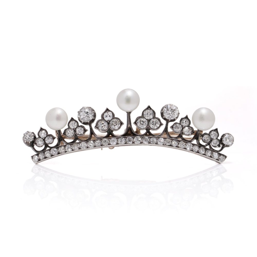 Diamond and pearl tiara brooch in rose gold and silver.