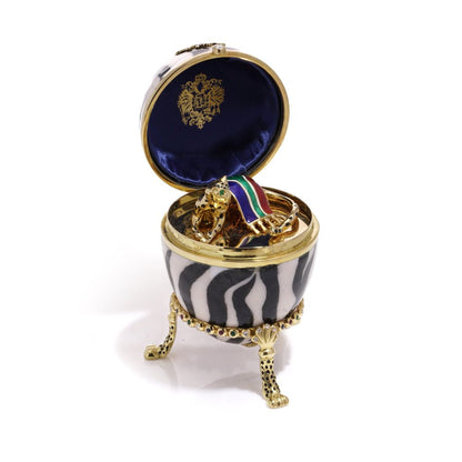 Faberge limited edition gold and enamel egg with gemstones.