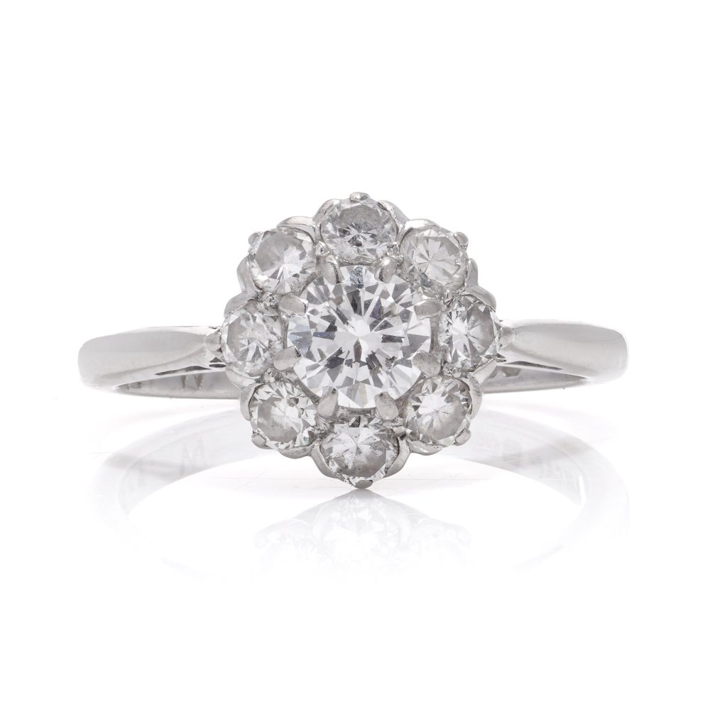 Vintage diamond cluster ring in white gold.