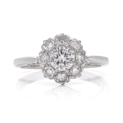 Vintage diamond cluster ring in white gold.