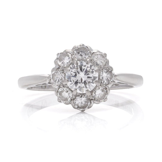 Vintage diamond cluster ring in white gold.