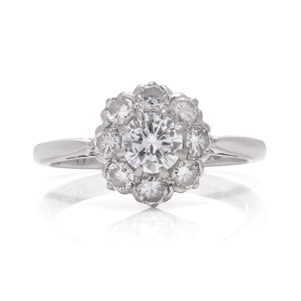 Vintage diamond cluster ring in white gold.