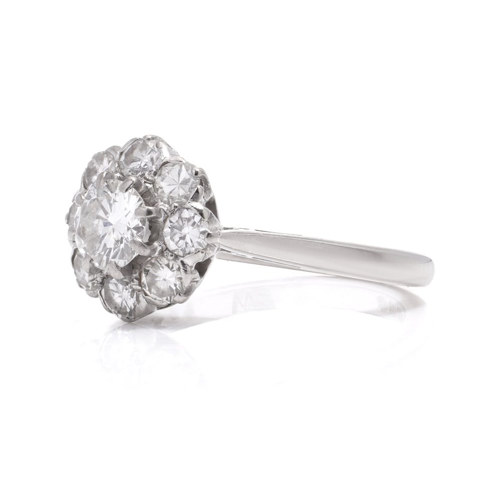 Vintage diamond cluster ring in white gold.