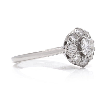 Vintage diamond cluster ring in white gold.