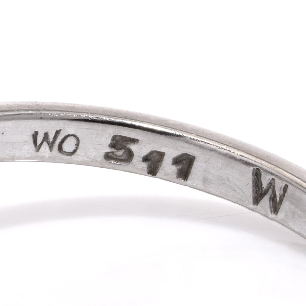 Vintage diamond cluster ring in white gold.