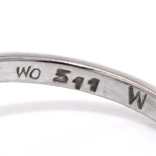 Vintage diamond cluster ring in white gold.