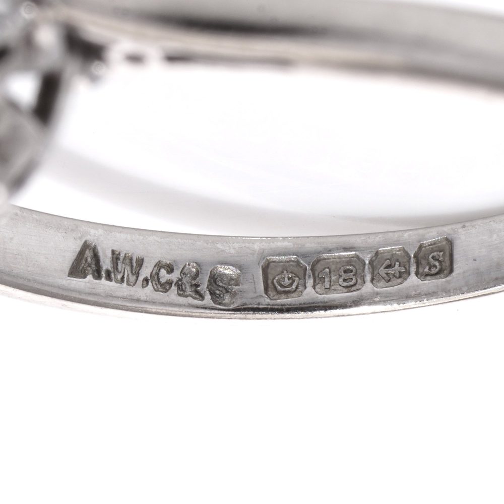 Vintage diamond cluster ring in white gold.