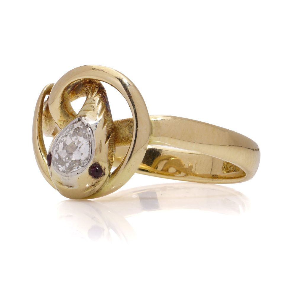 Victorian diamond and ruby head snake gold ring.
