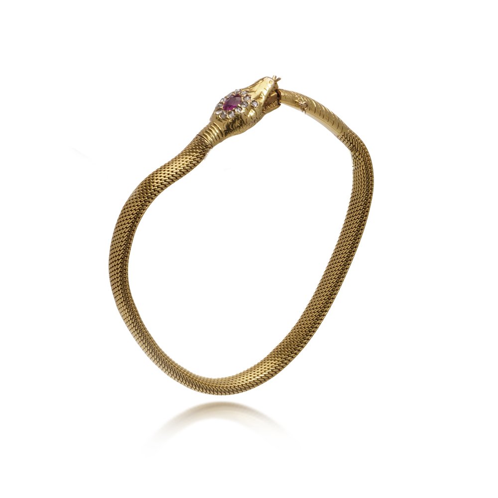 Antique Swedish gold bracelet with a ruby and diamonds.