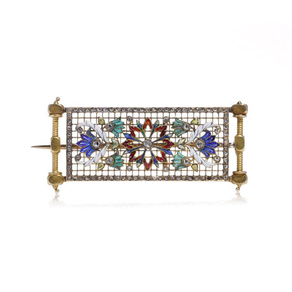 Lingerie pin brooch in gold with enamel and diamonds.