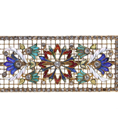 Lingerie pin brooch in gold with enamel and diamonds.