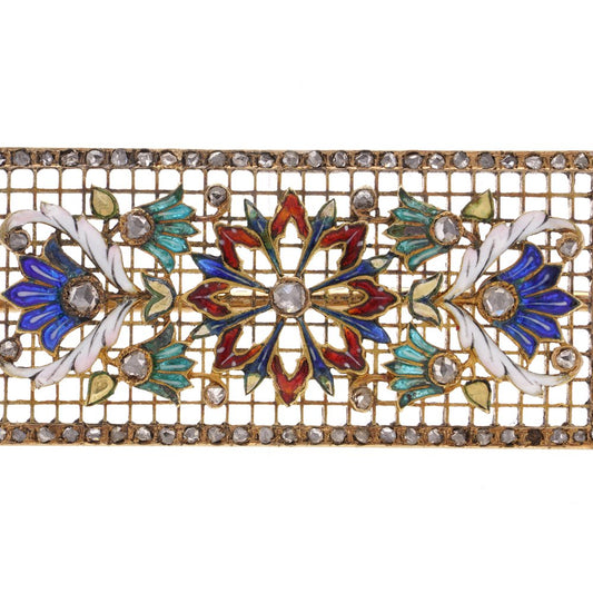 Lingerie pin brooch in gold with enamel and diamonds.