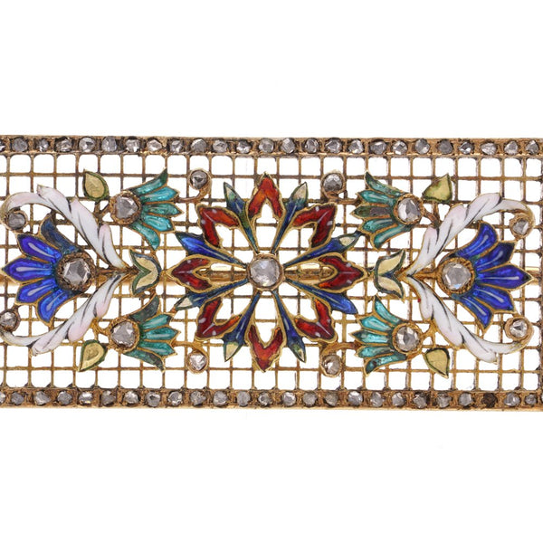 Lingerie pin brooch in gold with enamel and diamonds.