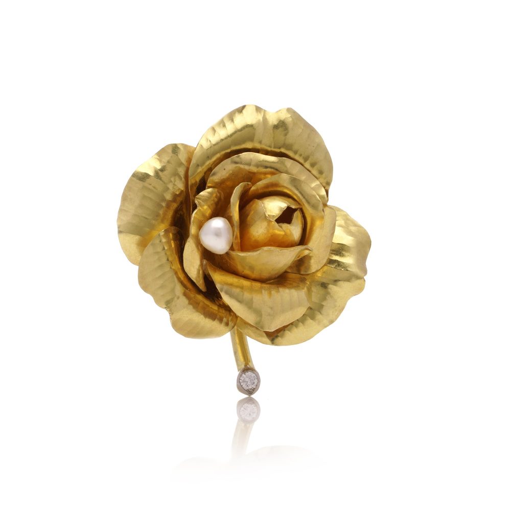 Cartier diamond and pearl rose brooch in gold.