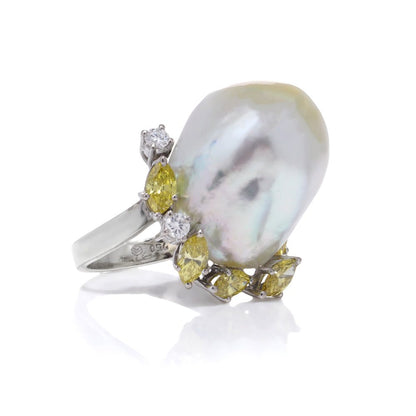 Baroque pearl and diamond ring in white gold.