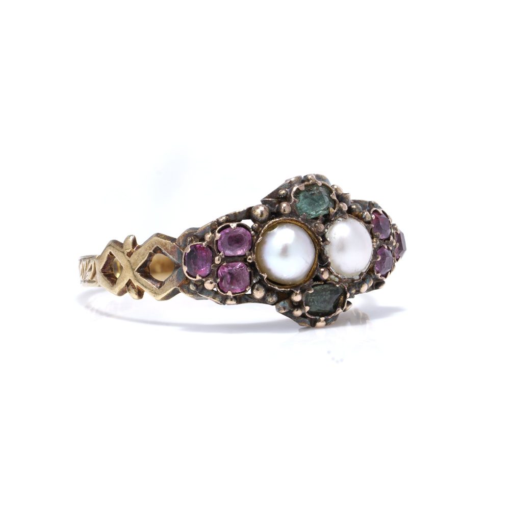 Victorian gold ring with pearls, amethysts, and emeralds.